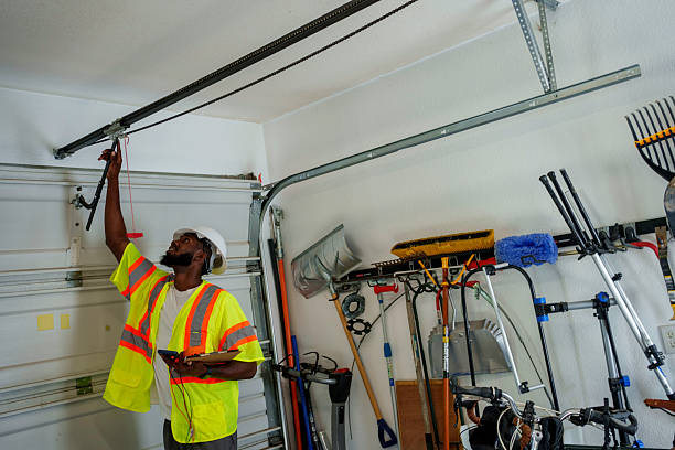 Professional Garage Door Panel Replacement technician working in Perkins, OK